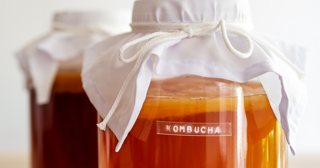 a jar of kombucha, a probiotic that supports gut health